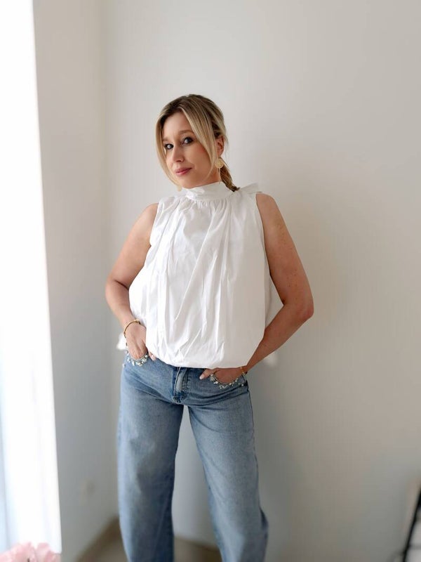 Witte blouse met strik en open rug