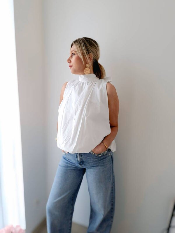 Witte blouse met strik en open rug